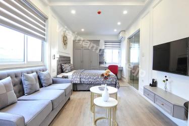 A beautiful studio serviced apartment in Dich Vong Hau Street with great balcony