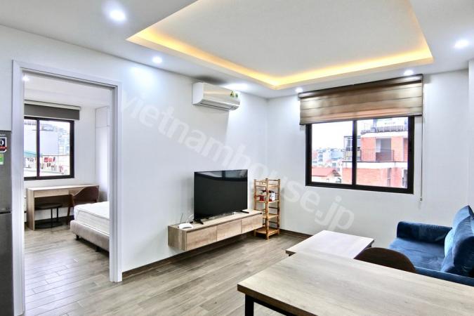Open-air 1-bedroom serviced apartment with many glass doors welcomes natural light